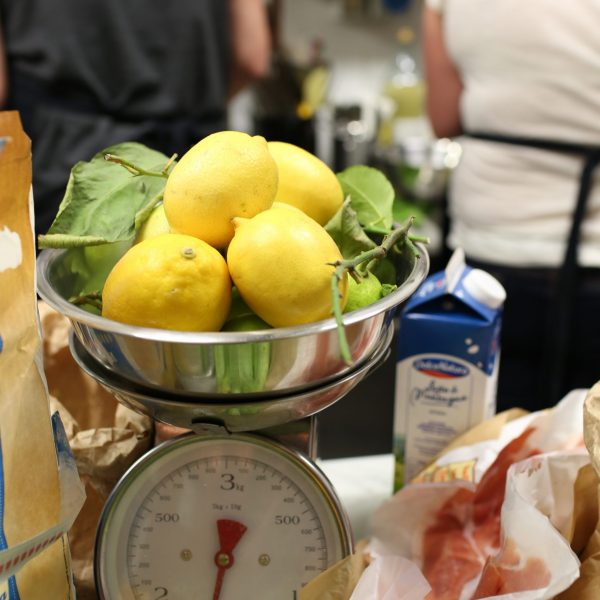 fresh lemons being weighed in the kitchen