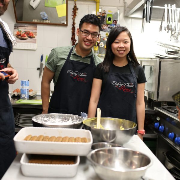 smiling students in the kitchen