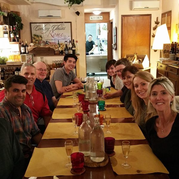 eating an italian meal at a large table